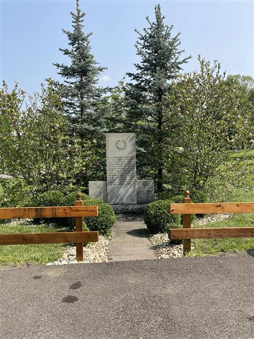 Image of the memorial after cleaning and painting.
